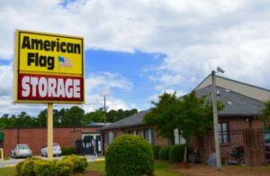 View of signage of American Flag Storage Murchison Road.